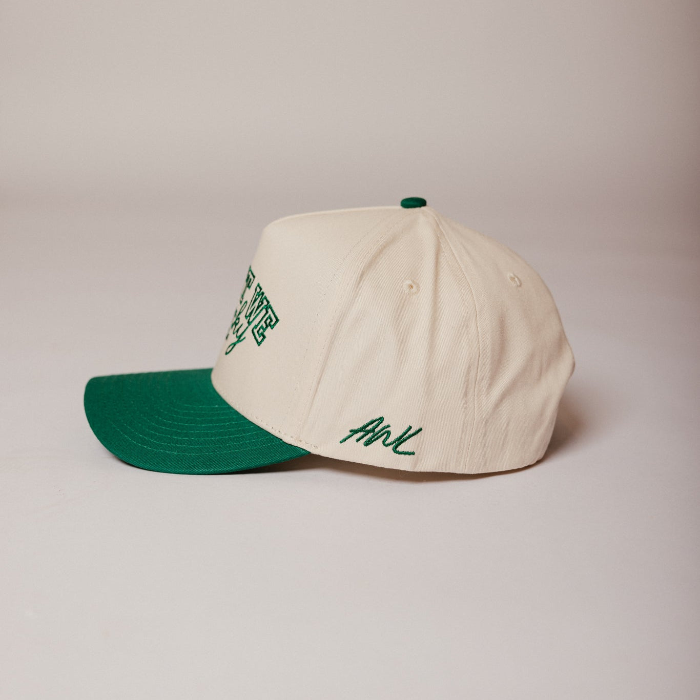 Two Tone Varsity Trucker Hat Green and White Aren't We Lucky AWL side