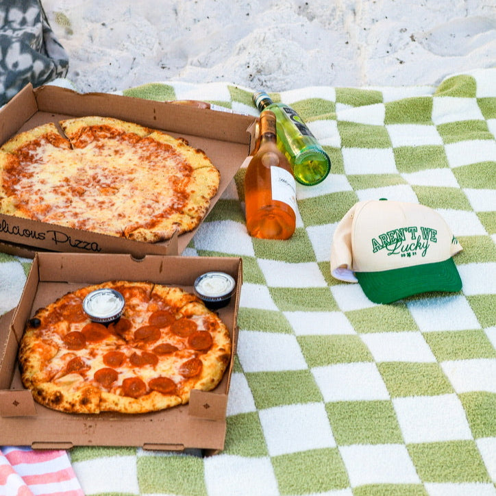 Lifestyle spread Two Tone Varsity Trucker Hat Green and White Aren't We Lucky
